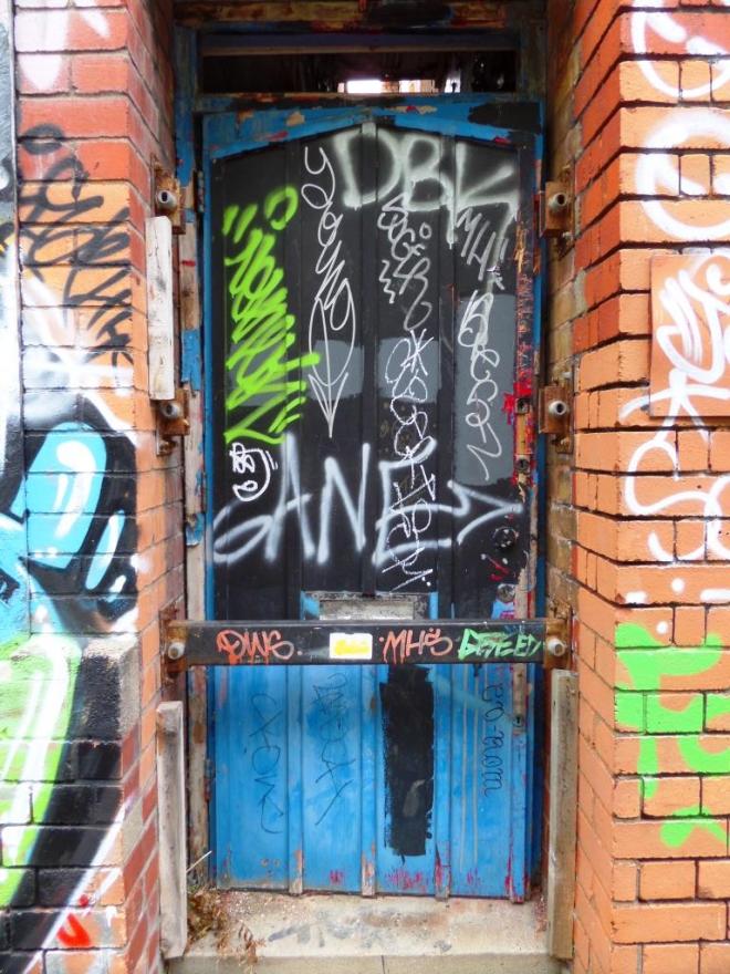 Graffiti door, Lydstep Terrace, Bristol