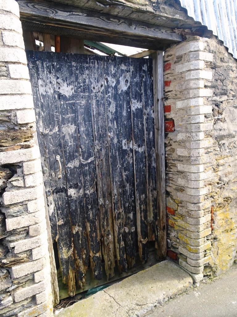 Boat builder's yard door, Fowey, Cornwall, September 2018