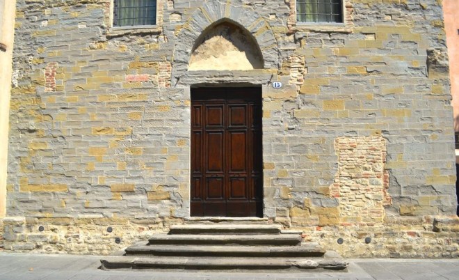 Grand doorway and bricked up door, Citta di Castello, Umbria, Italy, August 2018