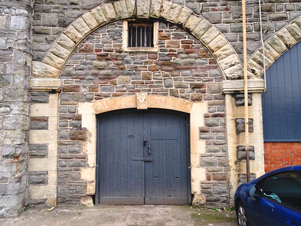 Doors to storeroom, Temple Meads Station, Bristol - why the drill holes in the bottom of the door?