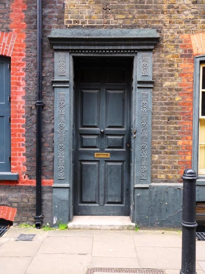 Door with beautiful surround, Fournier Street, London, April 2019