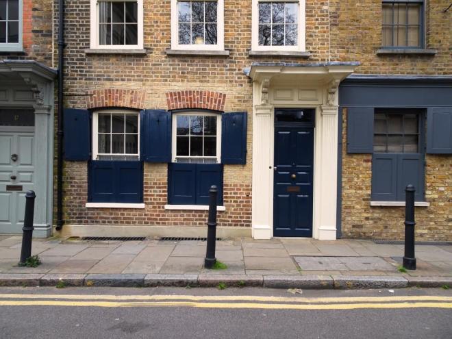 Dark blue door and matching shutters, Fournier Street, London, April 2019
