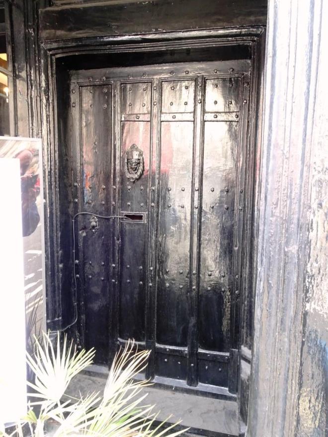 Rather old and redundant? Shop door, Dorchester, June 2019