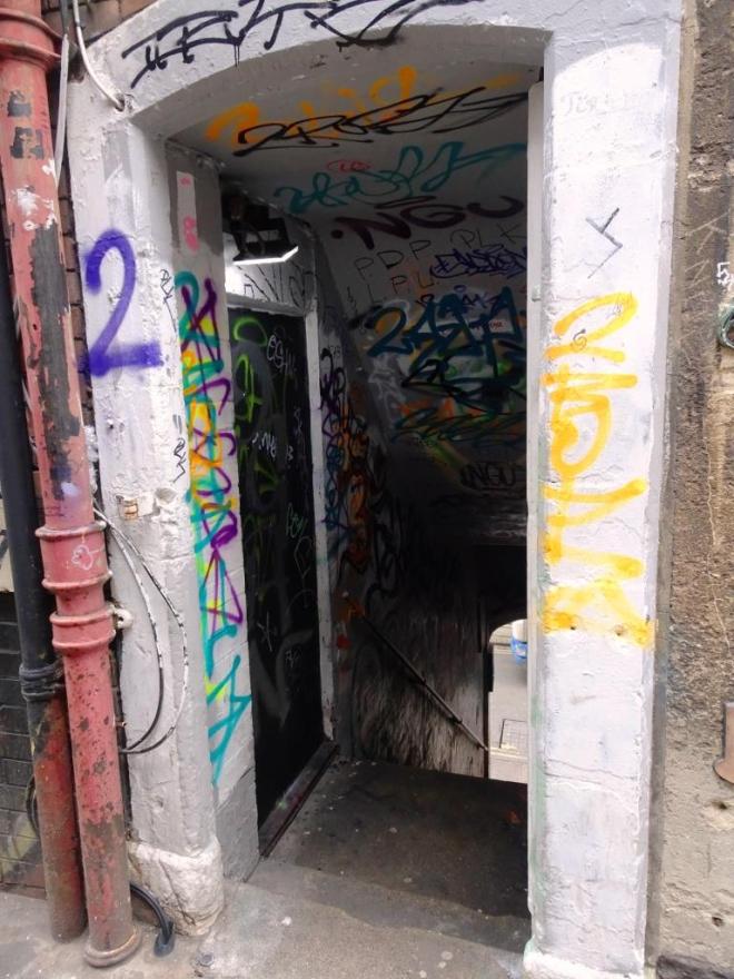 Archway and door in Leonard Lane, Bristol, March 2019