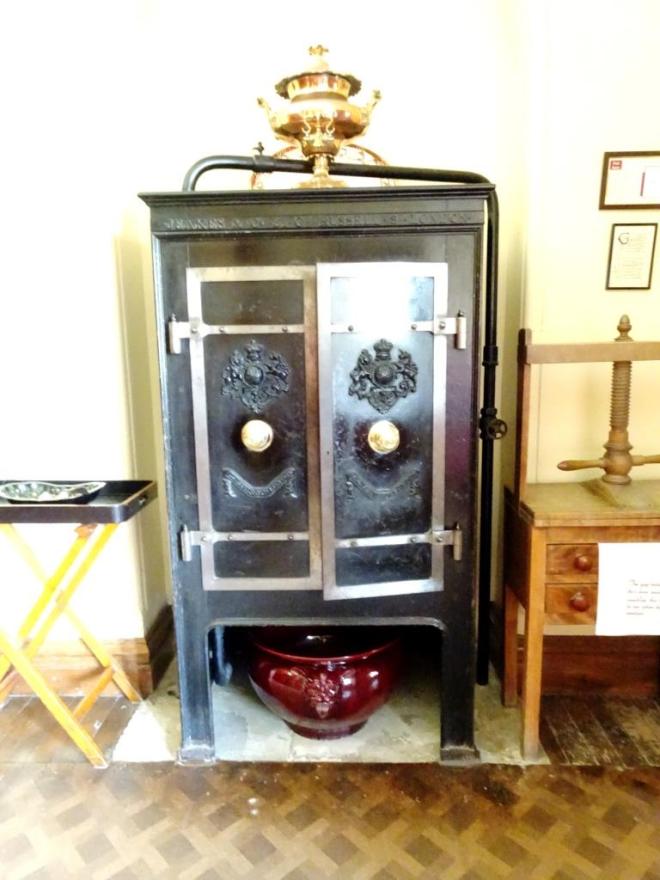 This cast iron cabinet kept the food warm between the kitchens and dining room, Lanhydrock House, Cornwall, August 2019
