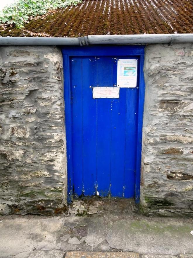 Fine blue gate (no handle?), somewhat weathered at the base, Fowey, Cornwall, September 2019