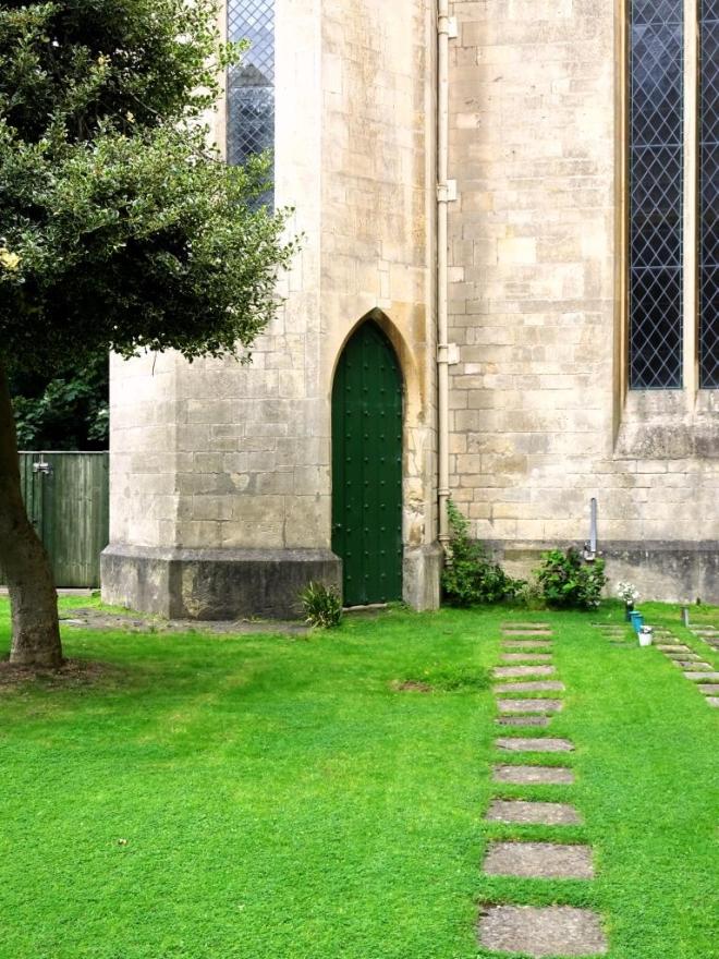 Manicured lawn and green door, Cheltenham, September 2019