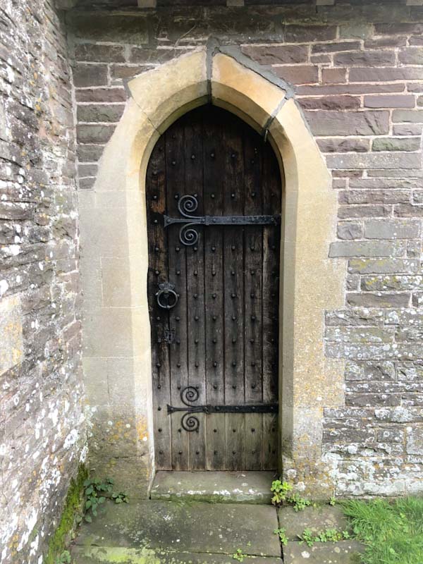 Side door, St Gastyn's Church, Llangorse Lake, Wales, December 2019