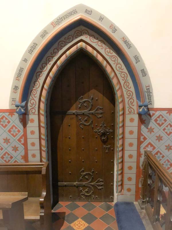 Ornate door surround, St Gastyn's Church, Llangorse Lake, Wales, December 2019