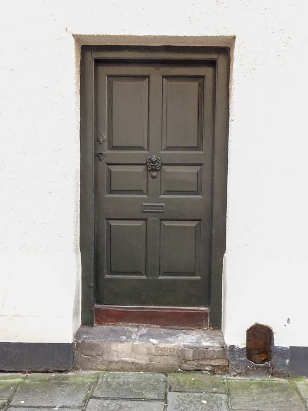Door with a boot scraper, Bristol, December 2019
