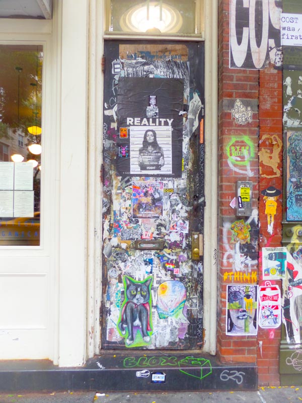 Wheatpaste door, East Village, New York, October 2017