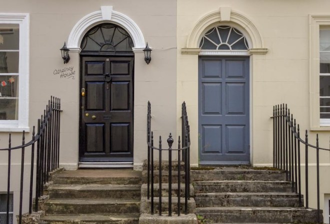 A fancy pair of doors, but where is the door furniture on the grey one? Cheltenham, September 2020