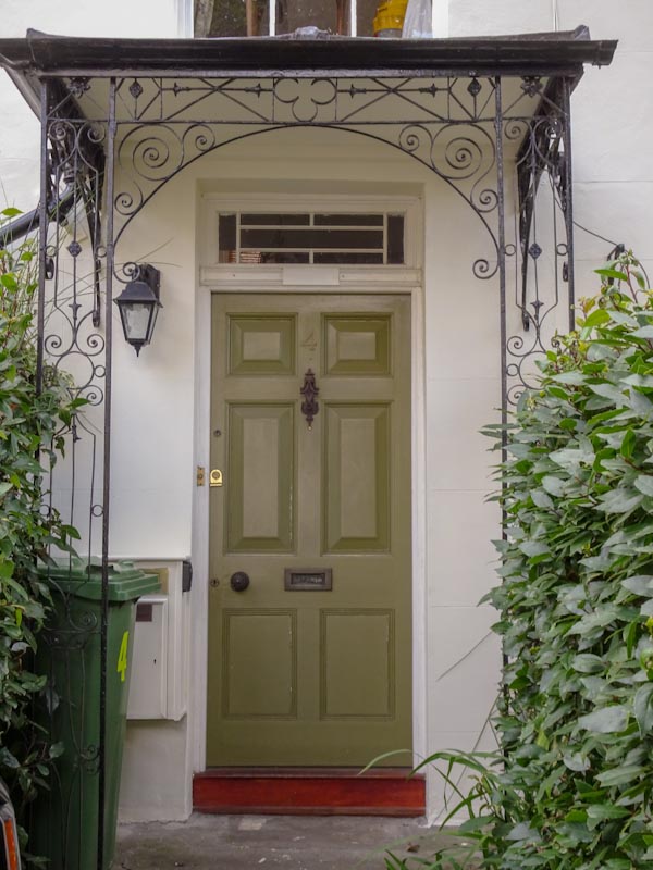 An ornate wrought iron awning, Cheltenham, September 2020