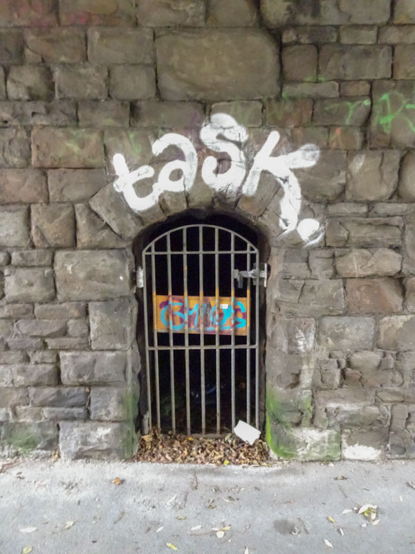 A gate in an arch of a bridge, Bristol, November 2020