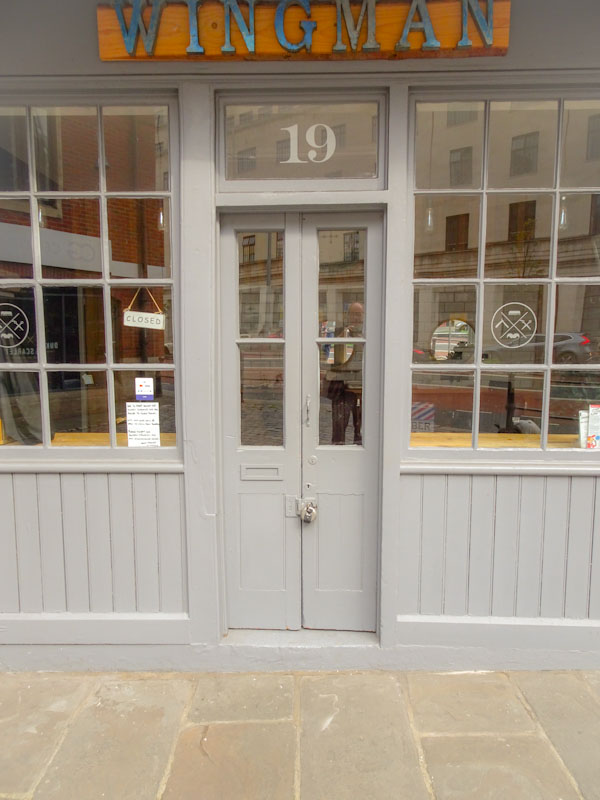 Wingman barbers door with doorfie, Christmas Steps, Bristol, June 2019