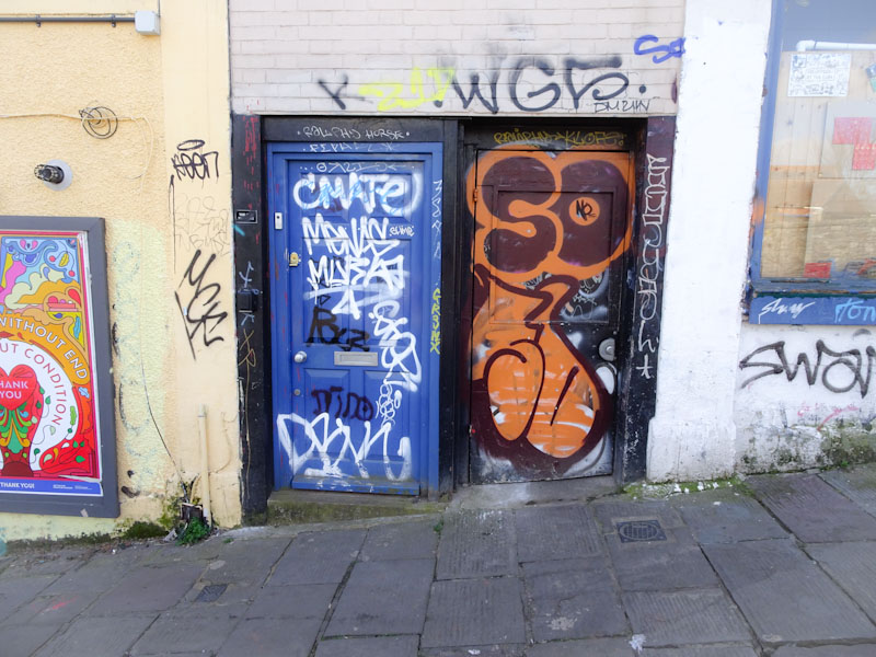 Two graffiti doors, Stokes Croft, Bristol, April 2021