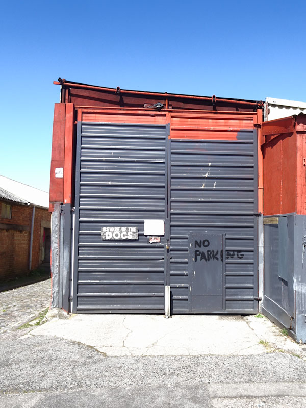 Beware of the dogs, No Parking, door within a door, Bedminster, Bristol, April 2021