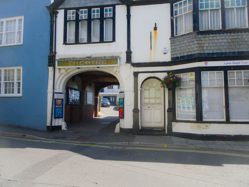 Archway to the theatre and door, Lyme Regis, Dorset, July 2021