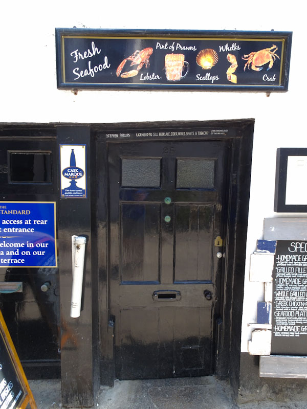 Wonky pub door, Lyme Regis, Dorset, July 2021