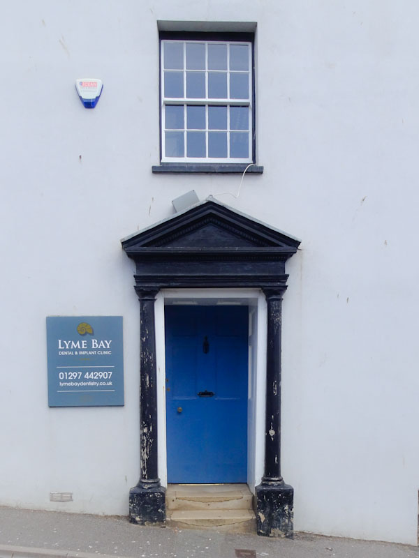 Blue door and stylish surround, Lyme Regis, Dorset, August 2021