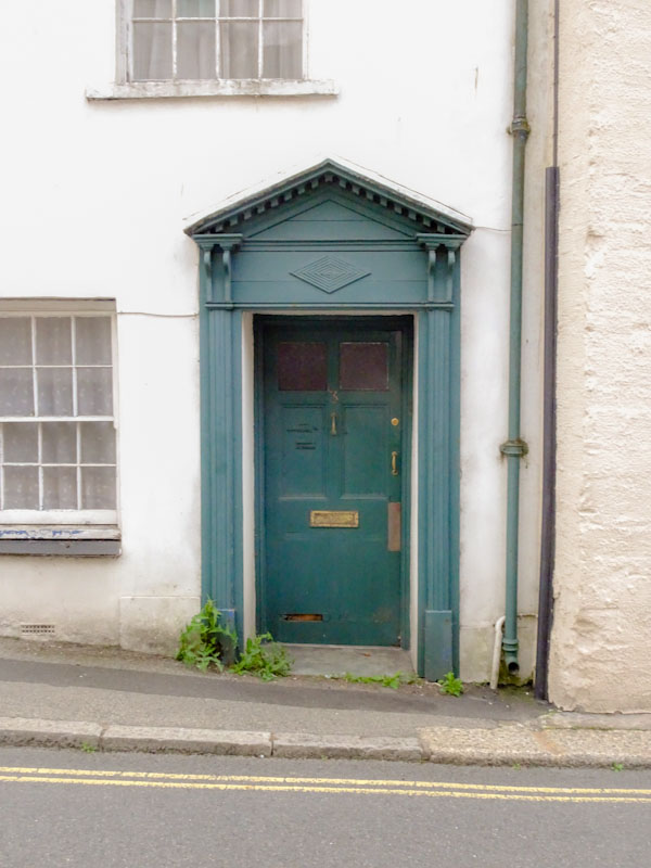 Green door with portico, Liskeard, Cornwall, August 2021
