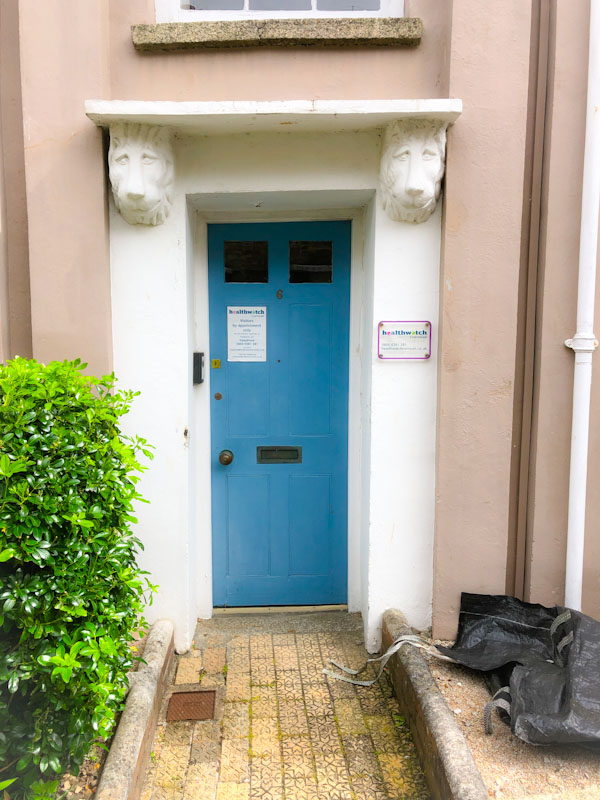 Door with grand lion portico, Truro, Cornwall, August 2021