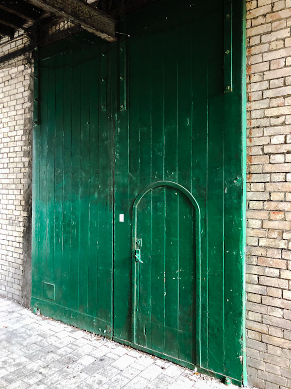 Green door within a door, Truro, Cornwall, August 2021