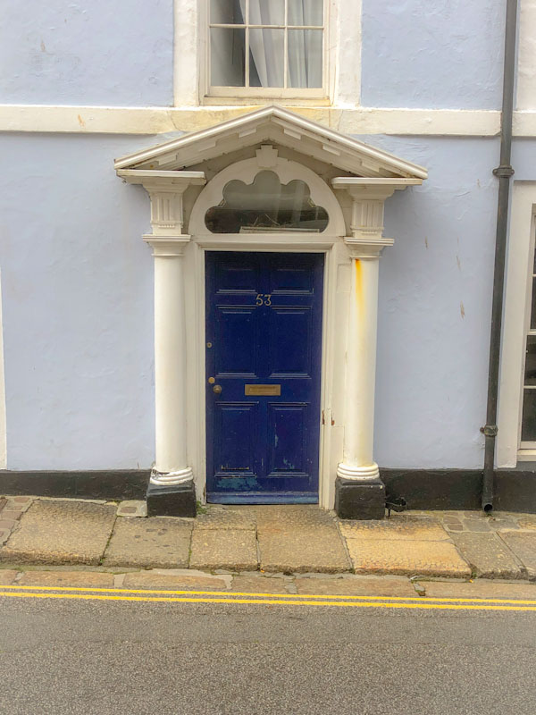 Blue door with superb neoclassical portico, Penzance, Cornwall, August 2021