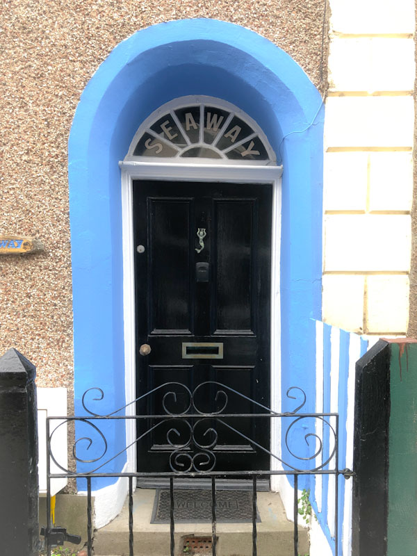 Seaway door and mermaid knocker, Looe, Cornwall, October 2021