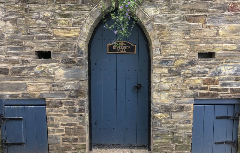 Three doors at Riverside hall, Looe, Cornwall, October 2021