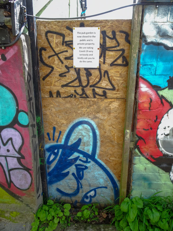 Temporary pub garden door in lock down, Bristol, May 2021