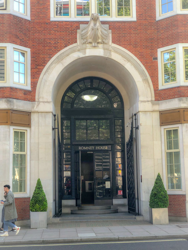 Enormous doorway to Romney House, Westminster, London, May 2022