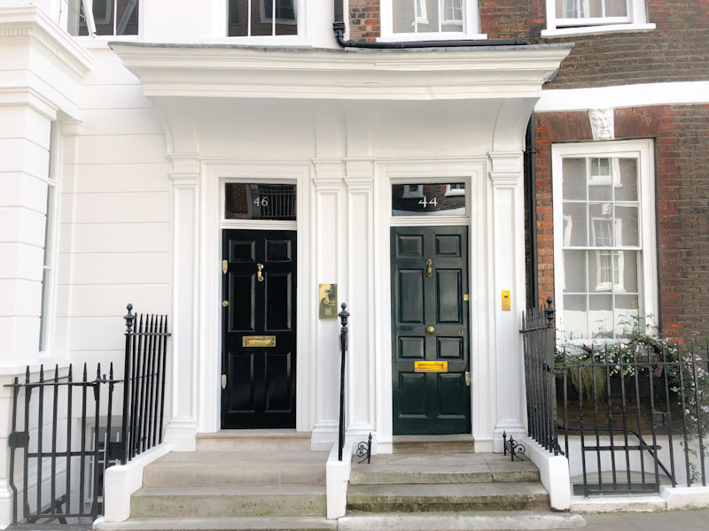 A fine pair of doors with an impressive shared awning, Westminster, London, May 2022
