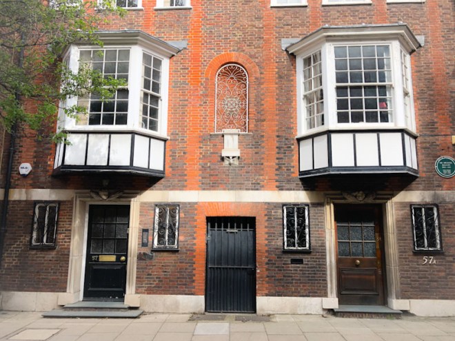 Three doors, including a tradesman's entrance, Westminster, London, May 2022