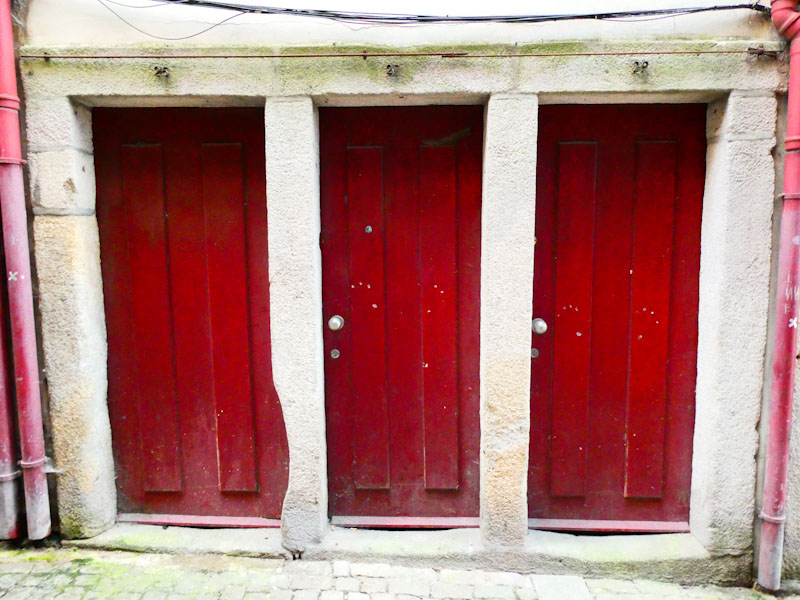 Three red doors, Porto, Portugal, June 2022
