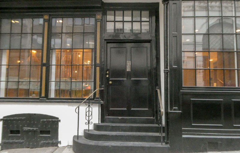Old black door and steps, Bristol, October 2022