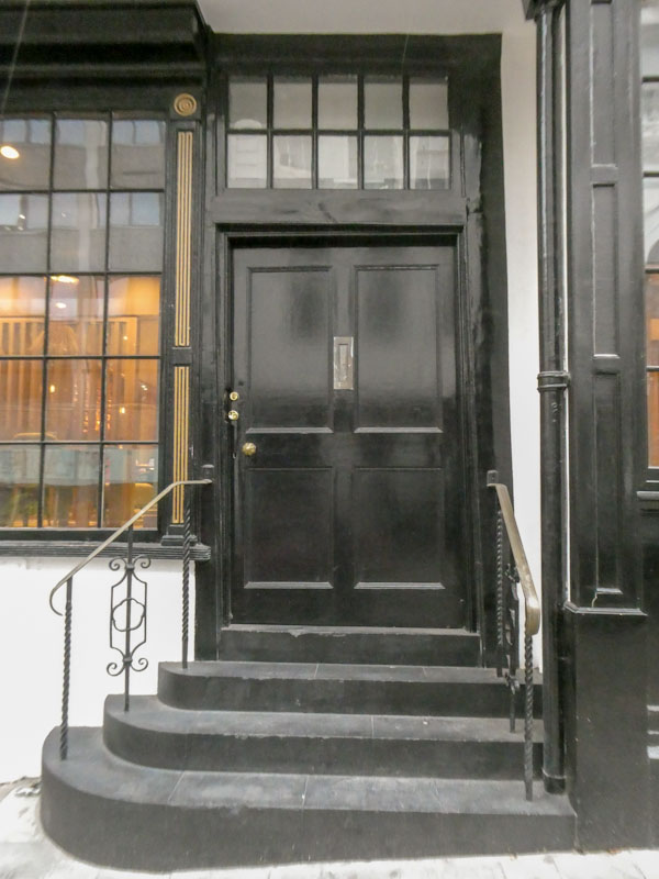 Old black door and steps, Bristol, October 2022