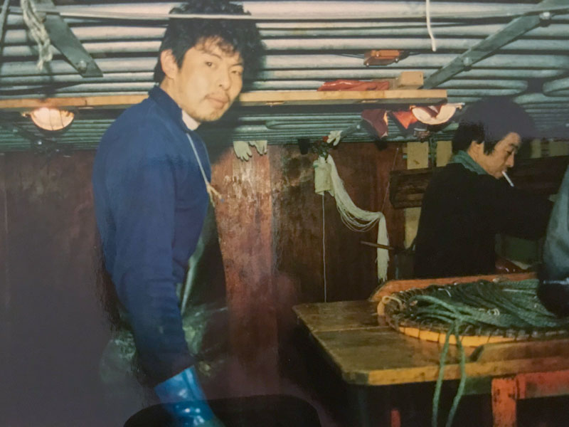Crew preparing baskets for the day's fishing, Koei Maru 30, July 1988