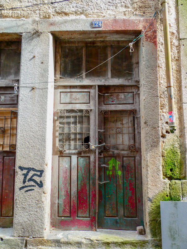 Old doors with nice metalwork, Porto, Portugal, June 2022