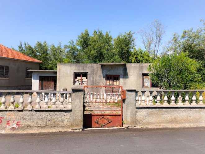 Gate, ballustrade and old door, Zaton, Croatia, August 2022