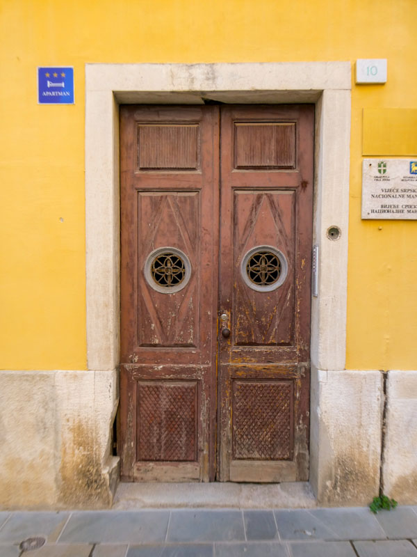 Pretty wooden door, Pula, Croatia, August 2023