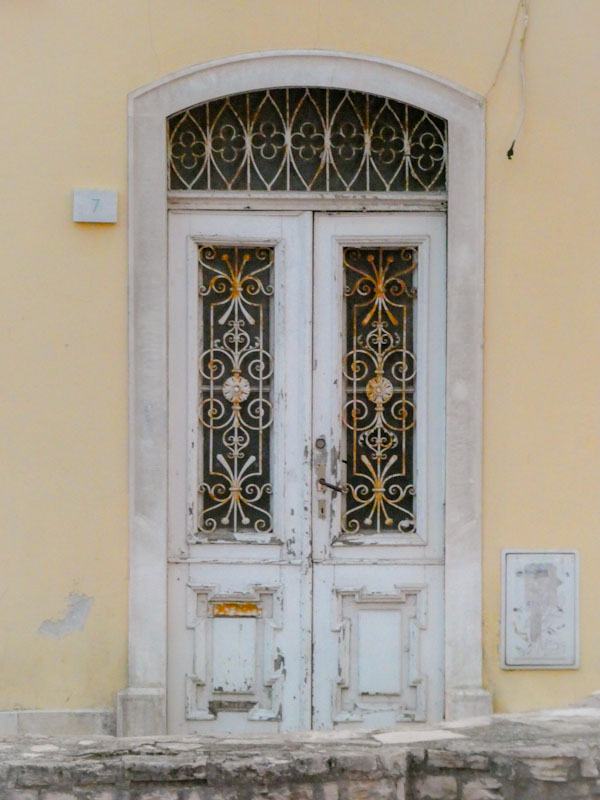 Beautiful iron work on these doors, Pula, Croatia, August 2022