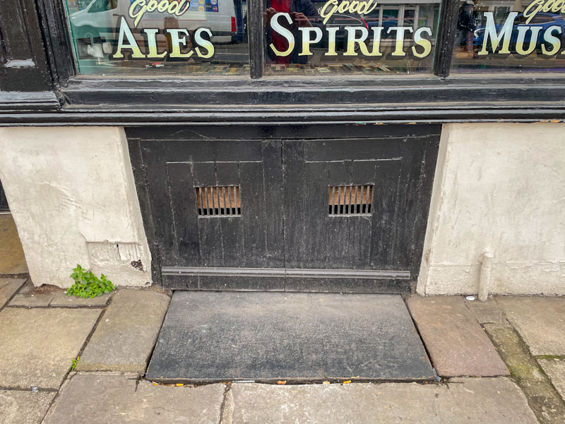 Pub cellar doors, Old Market, Bristol, May 2023