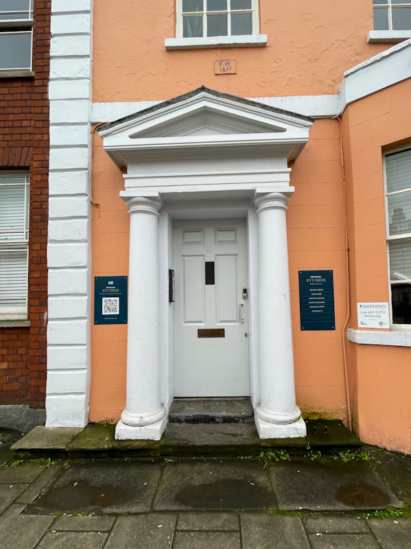 Plain door, grand doorway, Old Market, Bristol, May 2023