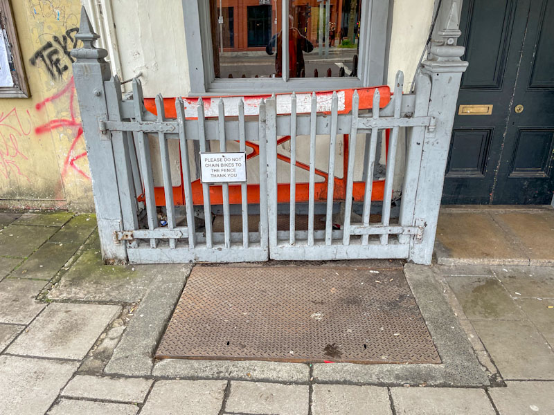Pub cellar doors and gates, Old Market, Bristol, May 2023