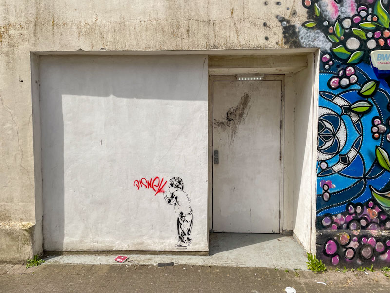 Dirty plain door and a little bit of graffiti, Weston-super-Mare, May 2023