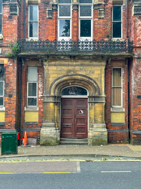 Grand door entrance and balcony, Lincoln, July 2023