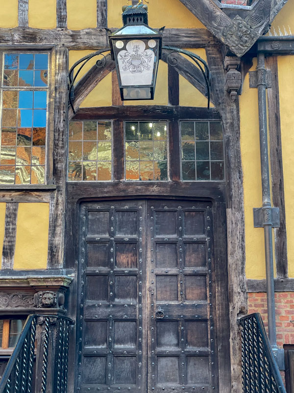 Tudor building and old wooden door, York, June 2023