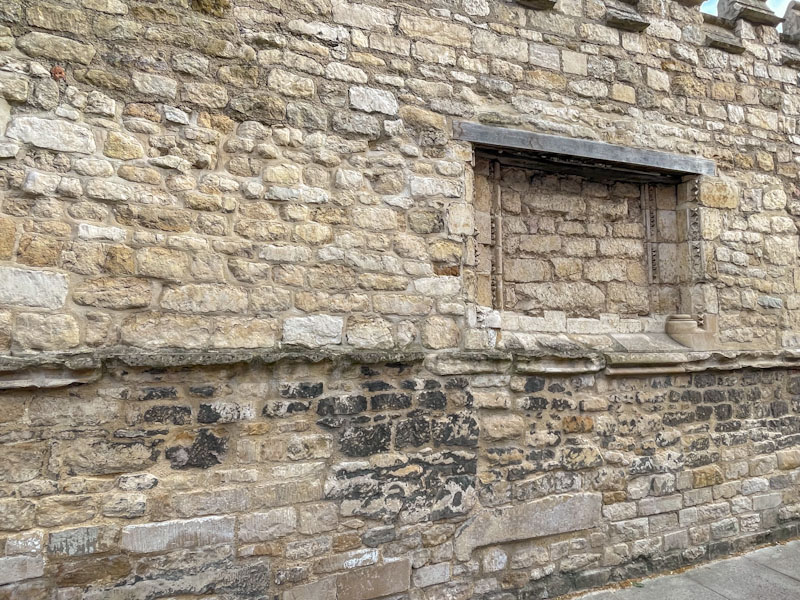 a hotchpotch of stonework with a recessed ghost window and lintel? Lincoln, July 2023