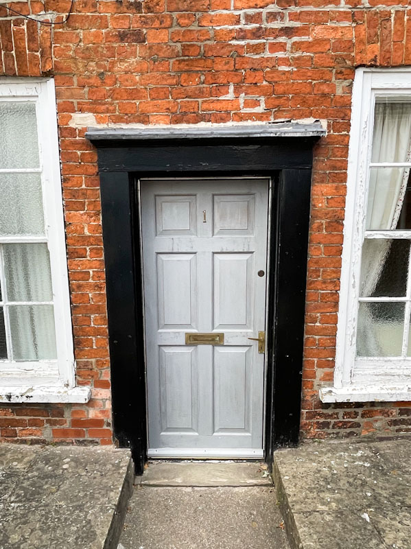 Low white door, Lincoln, July 2023